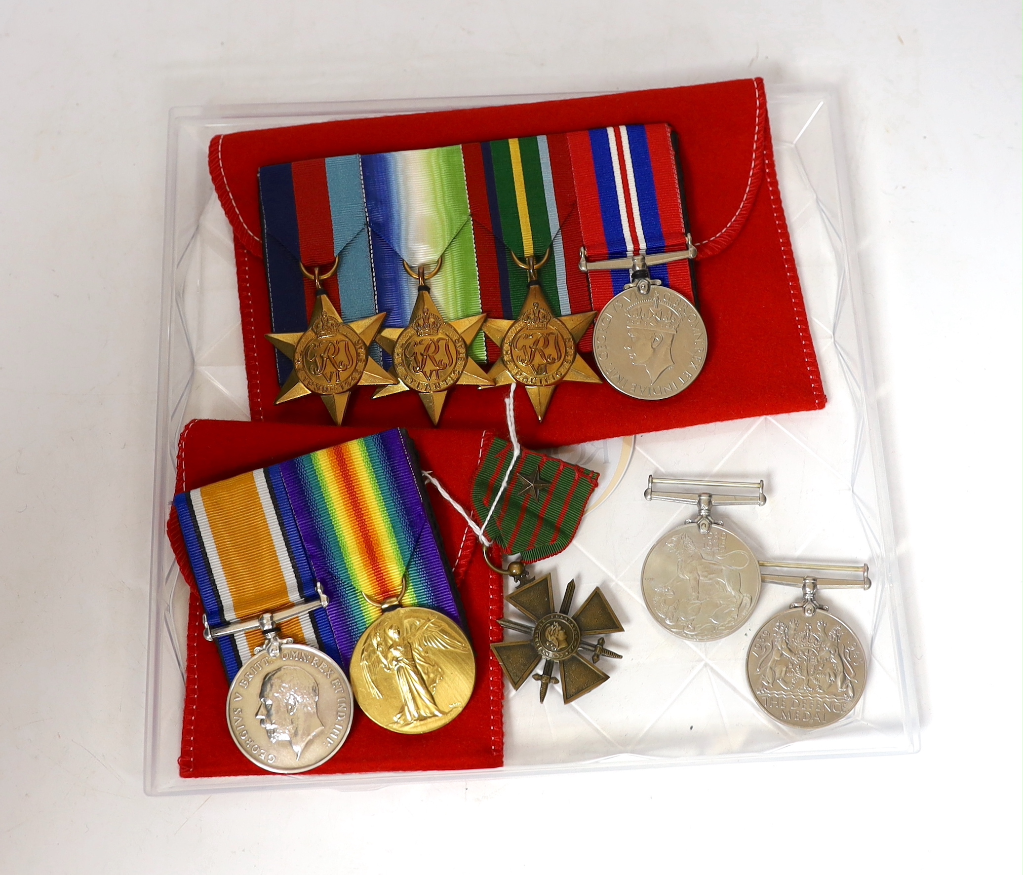 Nine WWI / WWII medals; a pair of WWI medals, the War medal and Victory medal to J.R. Hemmings R.A.F., a pair of WWII medals in O.H.M.S. card box to J.B. Robinson, with oak leaf, a group comprising; the 1939-45 Star, the